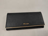 PRADA Prada Long Wallet Black with Gold Hardware and Saffiano Leather