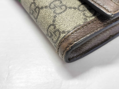 GUCCI GG Supreme Gucci GG Marmont 523153 PVC and Leather Round Zip Wallet Brown