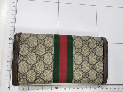 GUCCI GG Supreme Gucci GG Marmont 523153 PVC and Leather Round Zip Wallet Brown