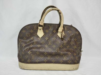LOUIS VUITTON Monogram Alma Handbag