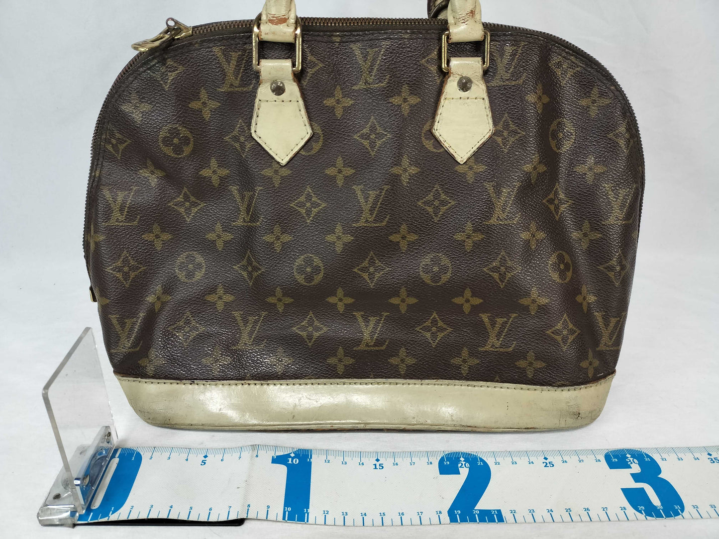 LOUIS VUITTON Monogram Alma Handbag