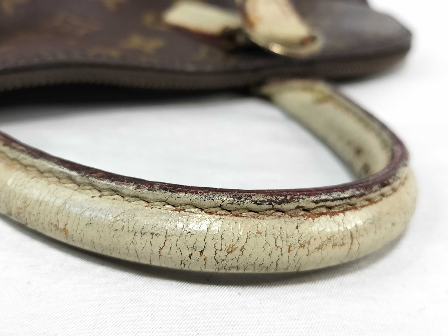 LOUIS VUITTON Monogram Alma Handbag