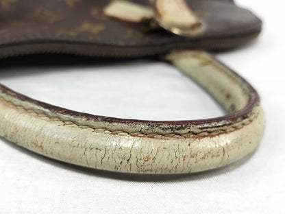 LOUIS VUITTON Monogram Alma Handbag