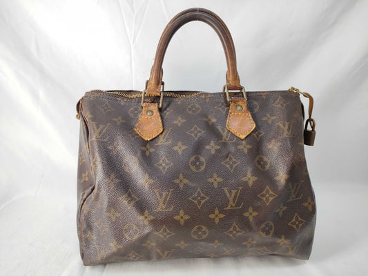 LOUIS VUITTON Monogram Louis Vuitton Monogram Speedy 30 Handbag