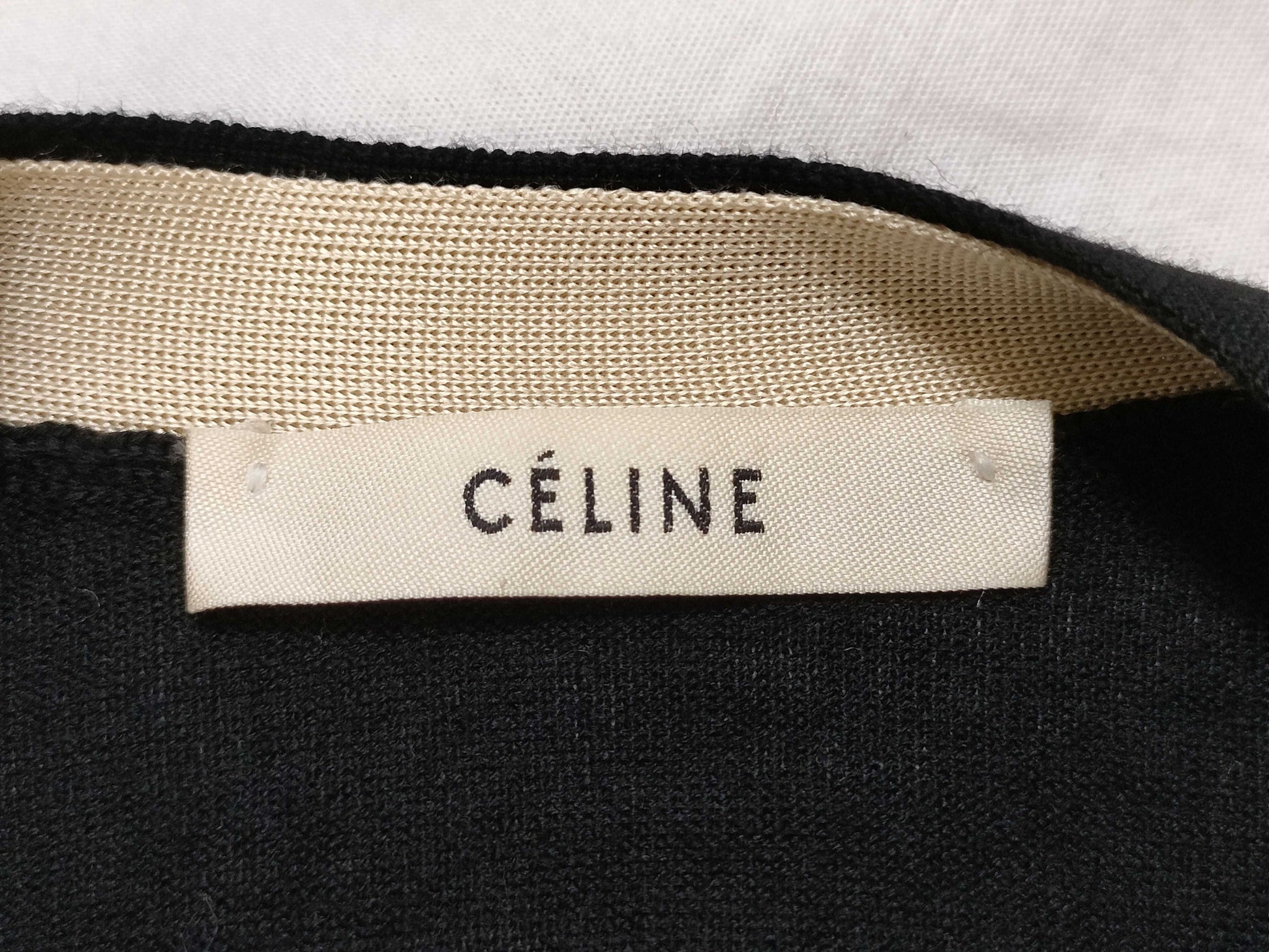CELINE Phoebe Triomphe Logo Embroidered Knit Cardigan in Black. Triomphe Logo Embroidered Wool Phoebe Fa Iro Cardigan.
