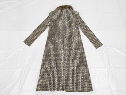 PLEATS PLEASE Issey Miyake long coat with fur collar and shoulder pads, all-over print