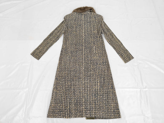 PLEATS PLEASE Issey Miyake long coat with fur collar and shoulder pads, all-over print