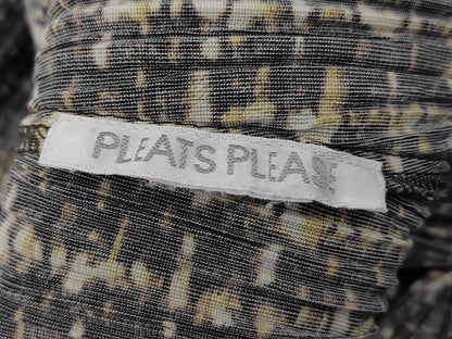 PLEATS PLEASE Issey Miyake long coat with fur collar and shoulder pads, all-over print