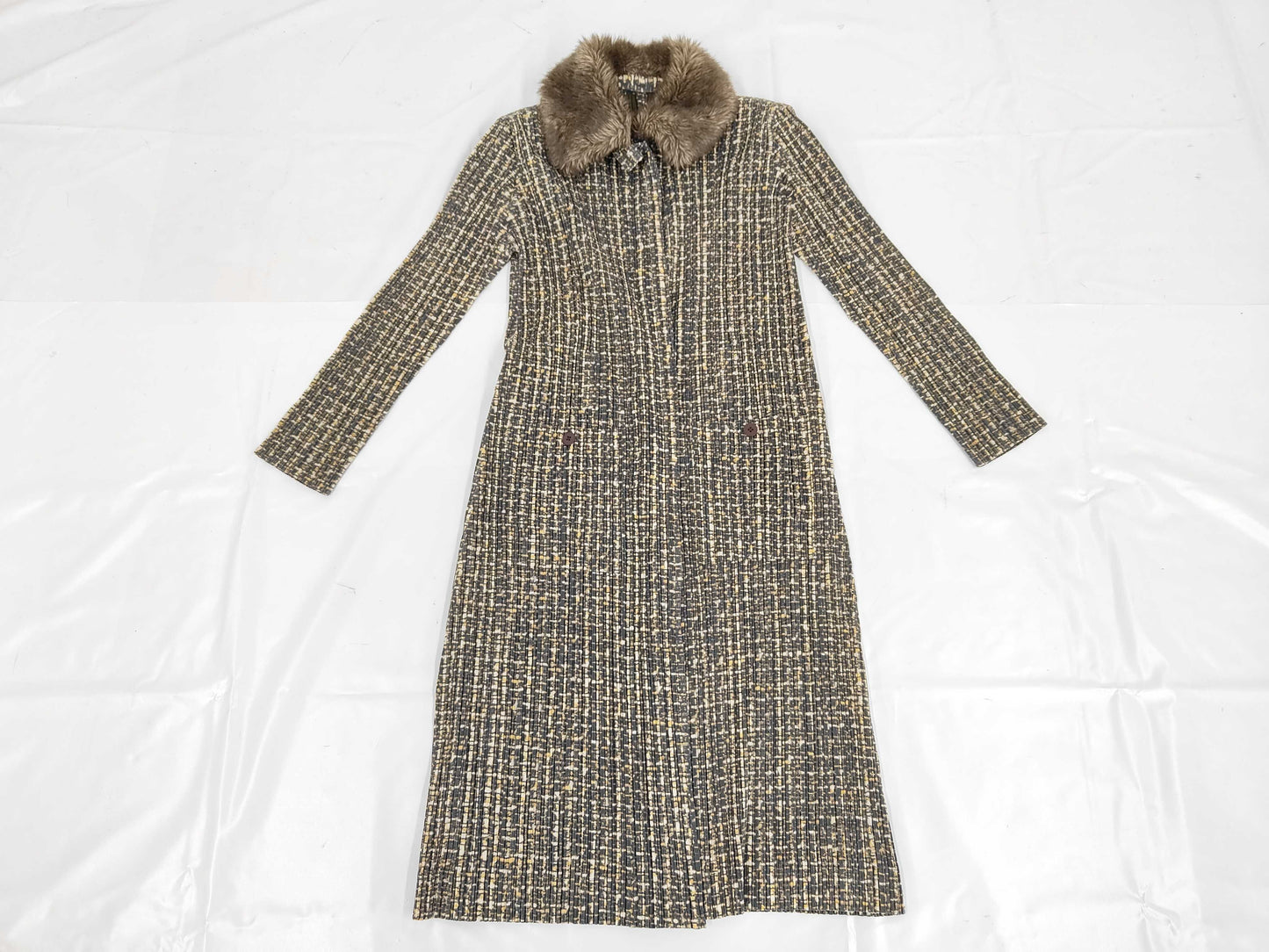 PLEATS PLEASE Issey Miyake long coat with fur collar and shoulder pads, all-over print