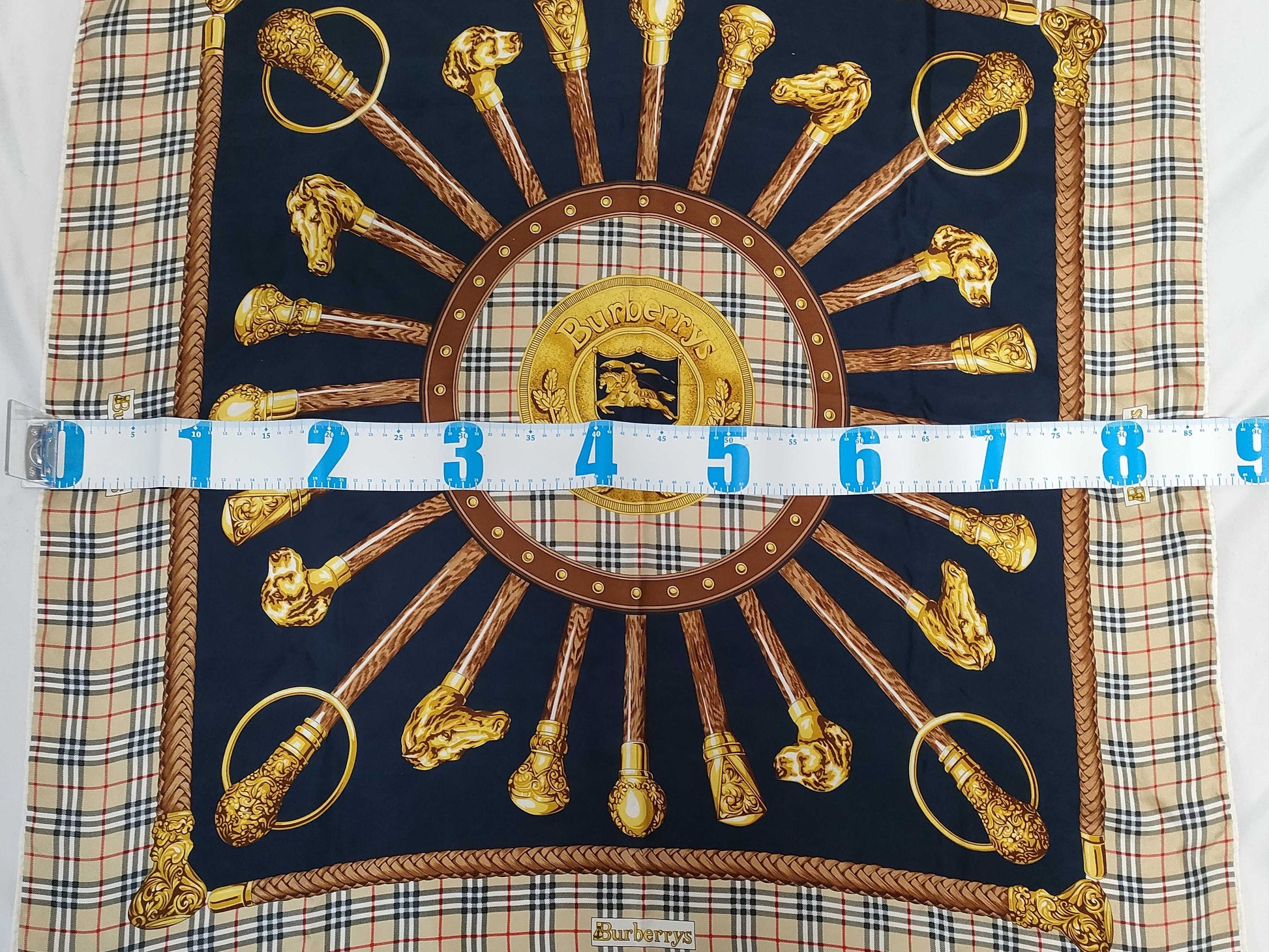 Burberrys all-over print silk scarf in beige and navy