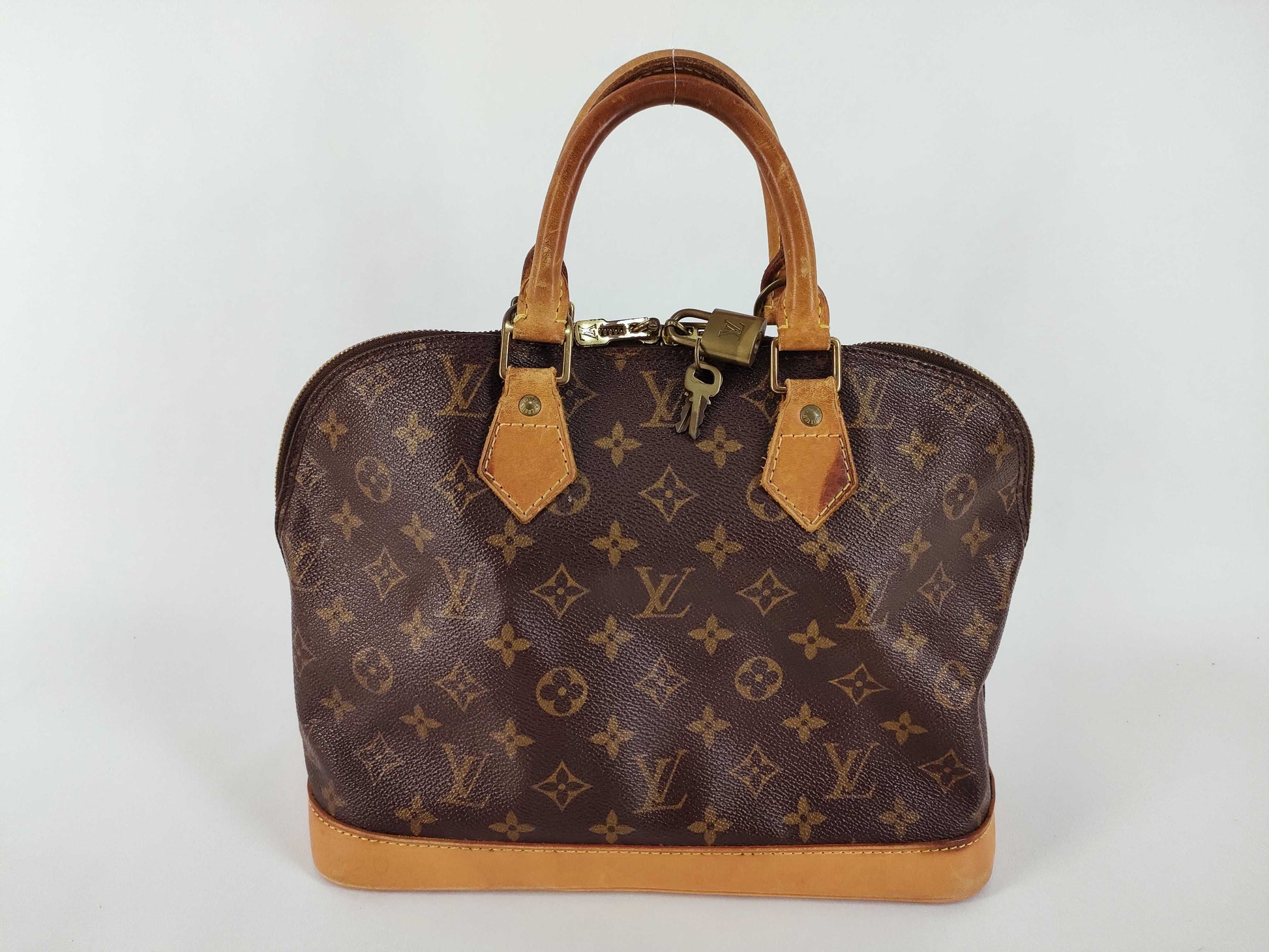 LOUIS VUITTON Monogram Louis Vuitton Alma PM Handbag Louis Vuitton Handbag