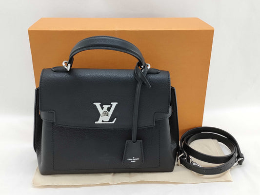 LOUIS VUITTON Calfskin Lock Me Ever BB Handbag