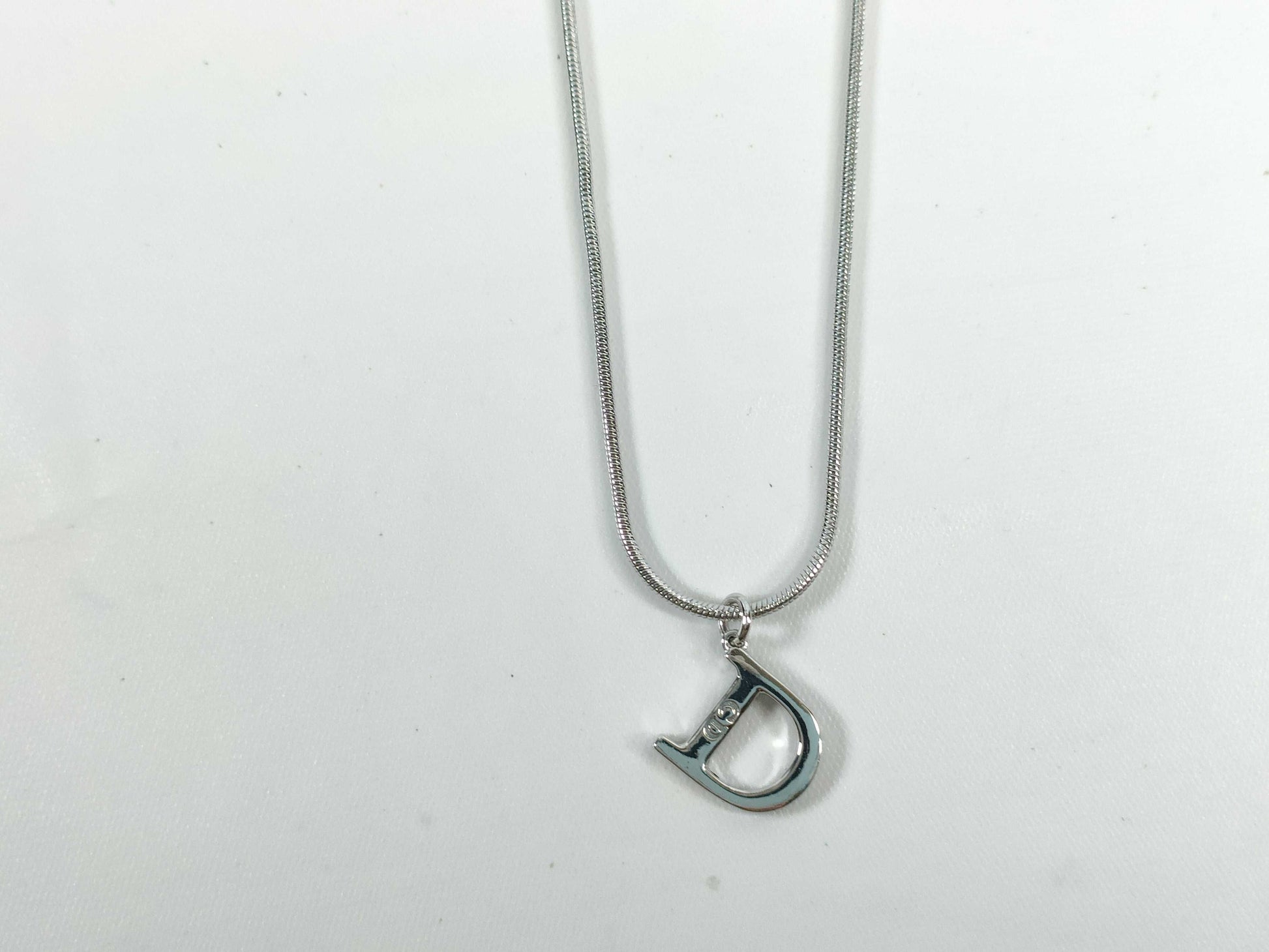 Dior D logo necklace