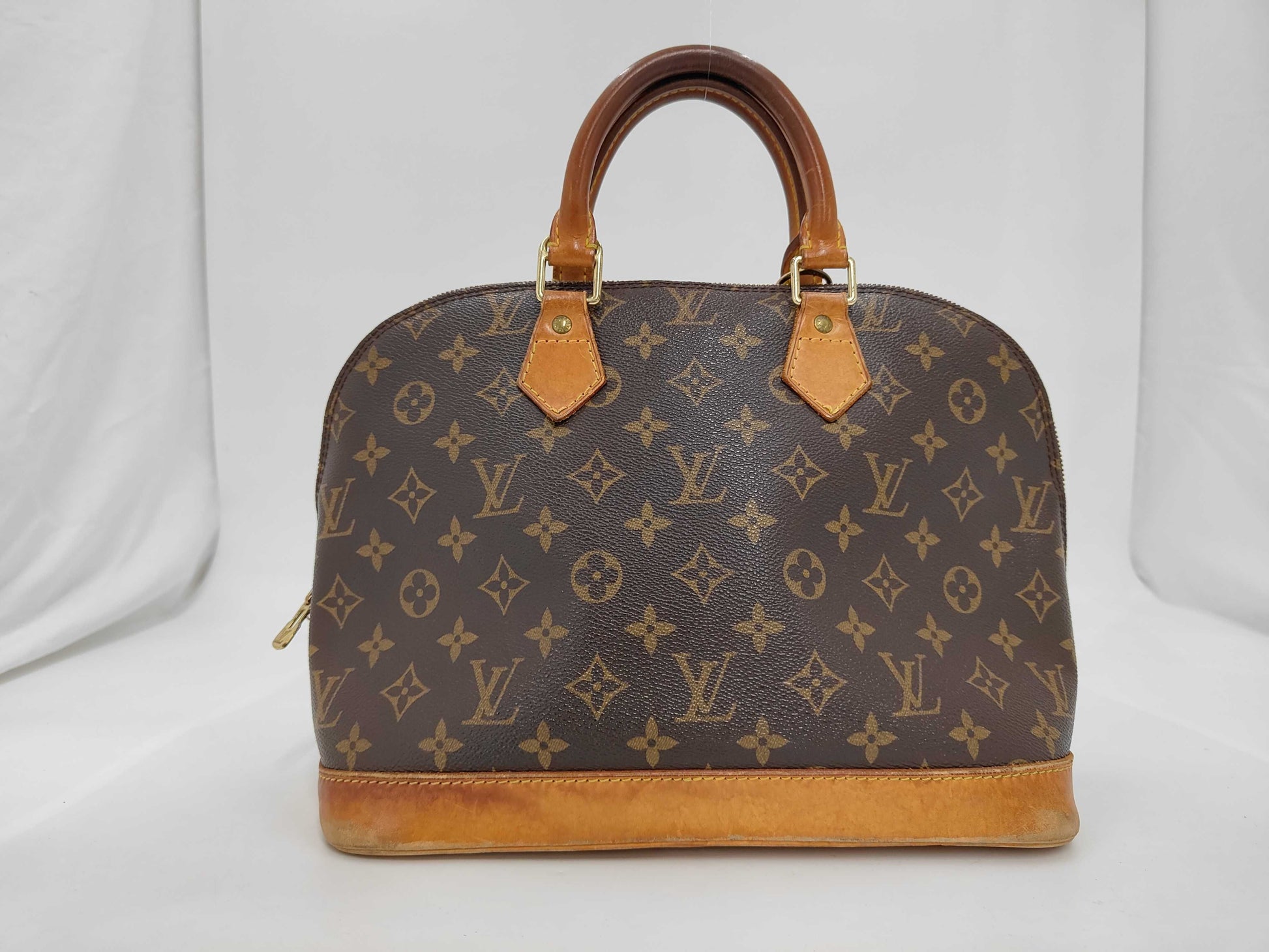LOUIS VUITTON Monogram Alma PM Handbag
