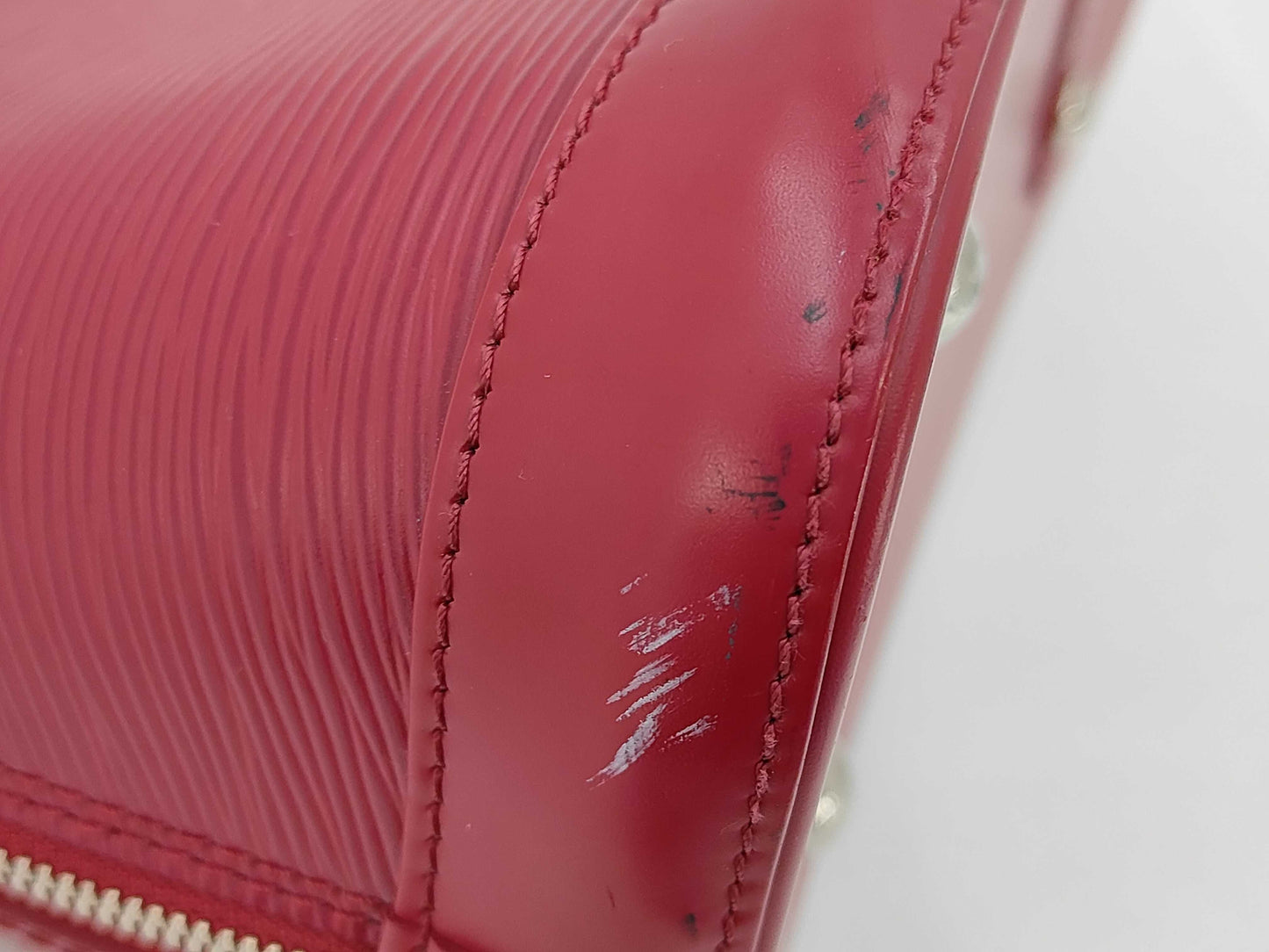 LOUIS VUITTON Epi Alma PM Handbag