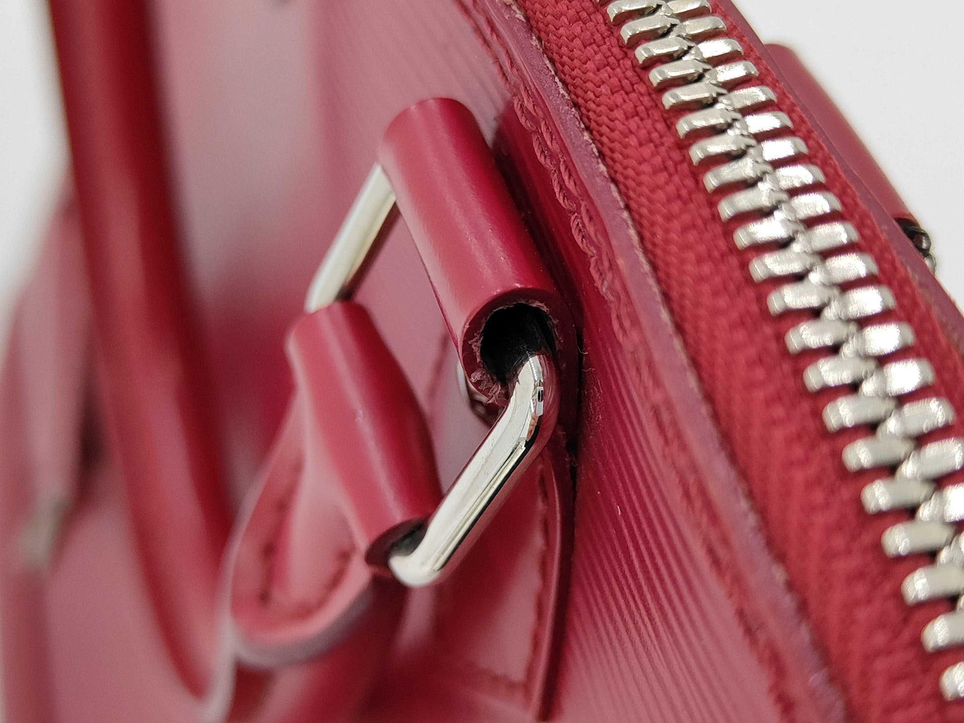 LOUIS VUITTON Epi Alma PM Handbag