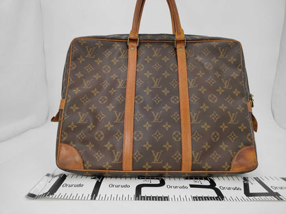 LOUIS VUITTON Monogram Porte-Document Voyage Handbag