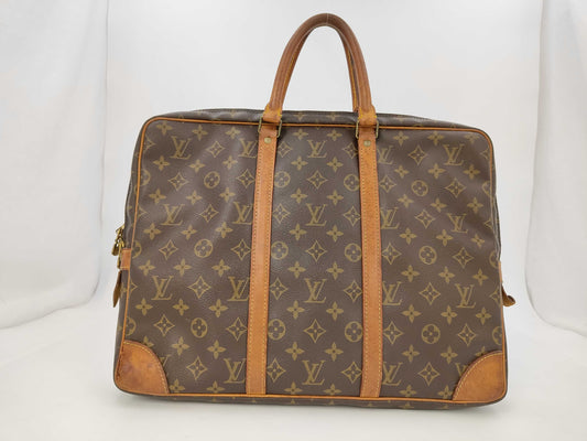 LOUIS VUITTON Monogram Porte-Document Voyage Handbag