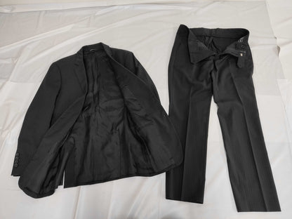 DOLCE & GABBANA Suits and other apparel