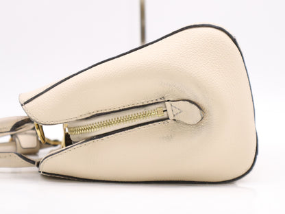 LOUIS VUITTON M50880 Empreinte Montaigne BB White Handbag with Shoulder Strap, Padlock, Two Keys, Cloche, and Poignier Closure