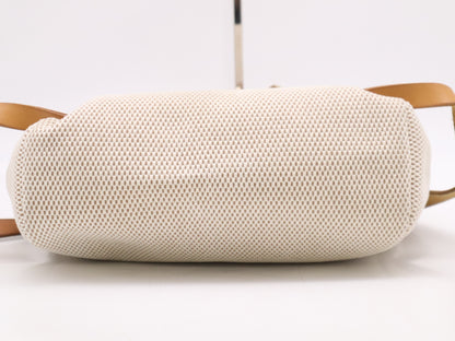 HERMES Toile GM x Leather Air Bag Ad PM Backpack in Brown, Beige, and Natural. Includes a padlock, two keys, a dust bag, and a box. H stamped. 2004.