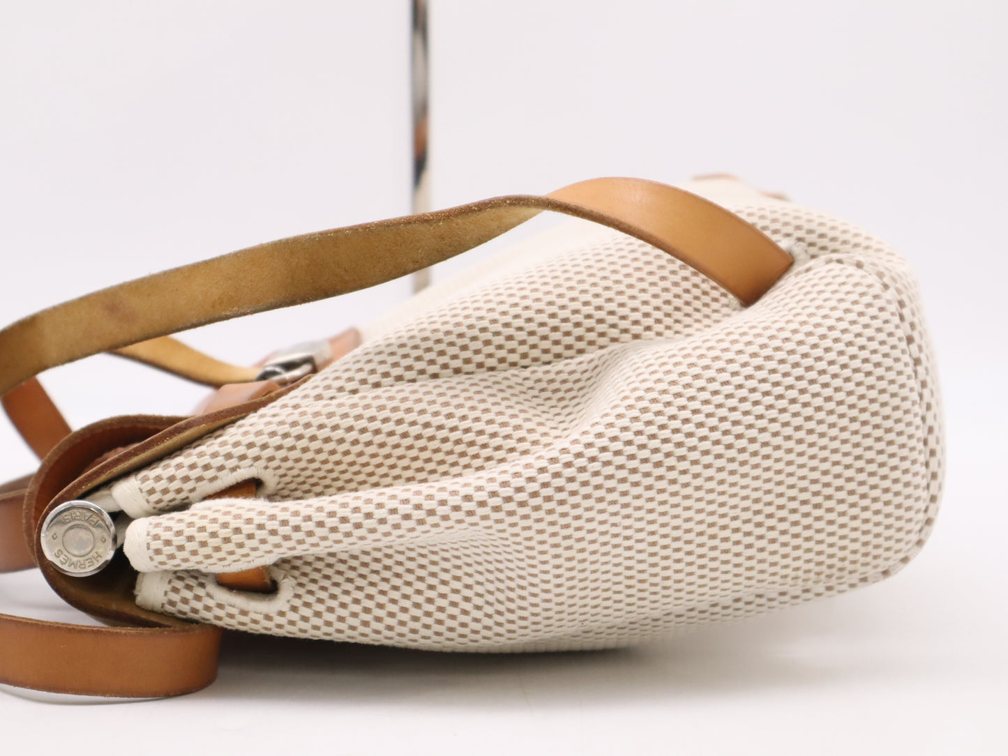 HERMES Toile GM x Leather Air Bag Ad PM Backpack in Brown, Beige, and Natural. Includes a padlock, two keys, a dust bag, and a box. H stamped. 2004.