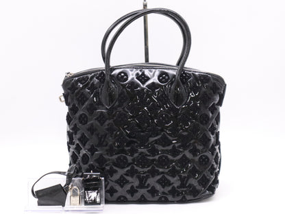 LOUIS VUITTON M40602 Fashionation Lockit Bouclette Noir Handbag with Cadena, Two Keys, Cloche, and Poignier