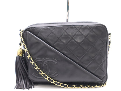 CHANEL Lambskin Matelasse 22 Shoulder Bag with Fringe, Tassel, and GD Hardware, Black Seal, 1563828
