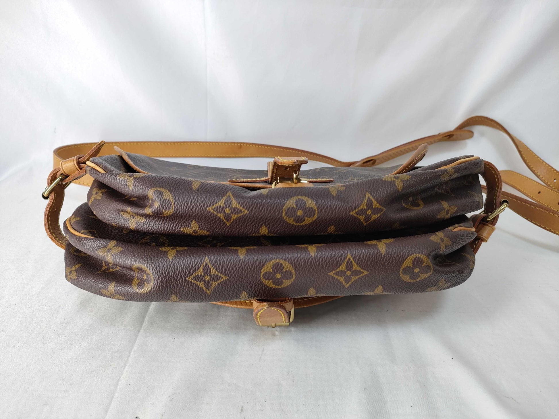 LOUIS VUITTON Monogram Saumur 30 Shoulder Bag *Shoulder bag has cracks and one missing screw. Vuitton CP Shoulder Bag