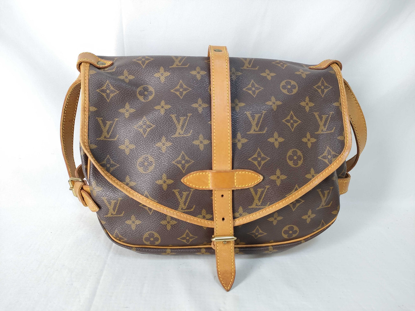 LOUIS VUITTON Monogram Saumur 30 Shoulder Bag *Shoulder bag has cracks and one missing screw. Vuitton CP Shoulder Bag