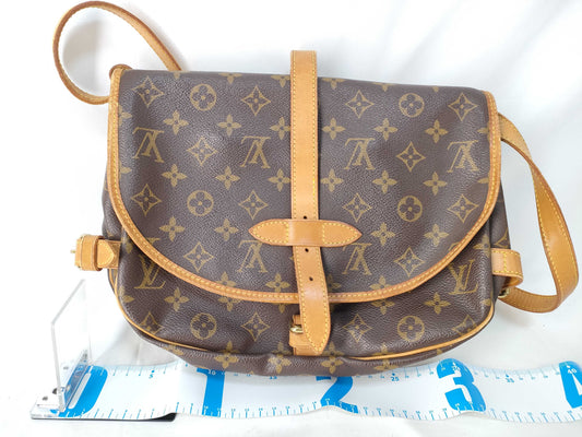 LOUIS VUITTON Monogram Saumur 30 Shoulder Bag *Shoulder bag has cracks and one missing screw. Vuitton CP Shoulder Bag