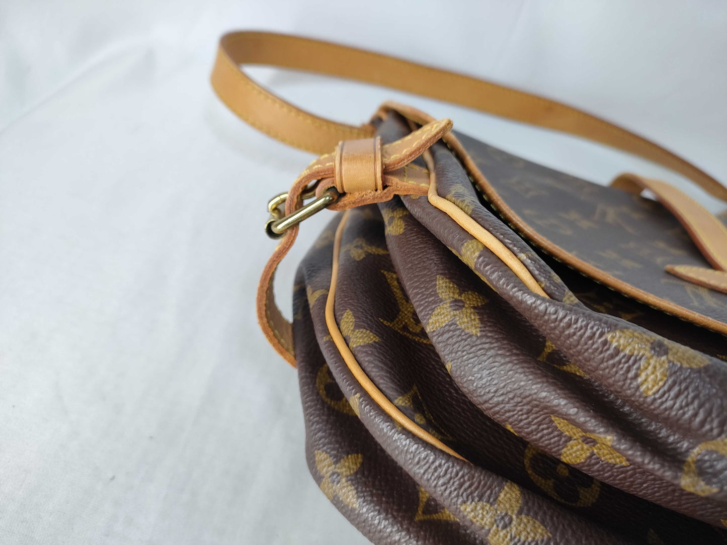 LOUIS VUITTON Monogram Saumur 30 Shoulder Bag *Shoulder bag has cracks and one missing screw. Vuitton CP Shoulder Bag