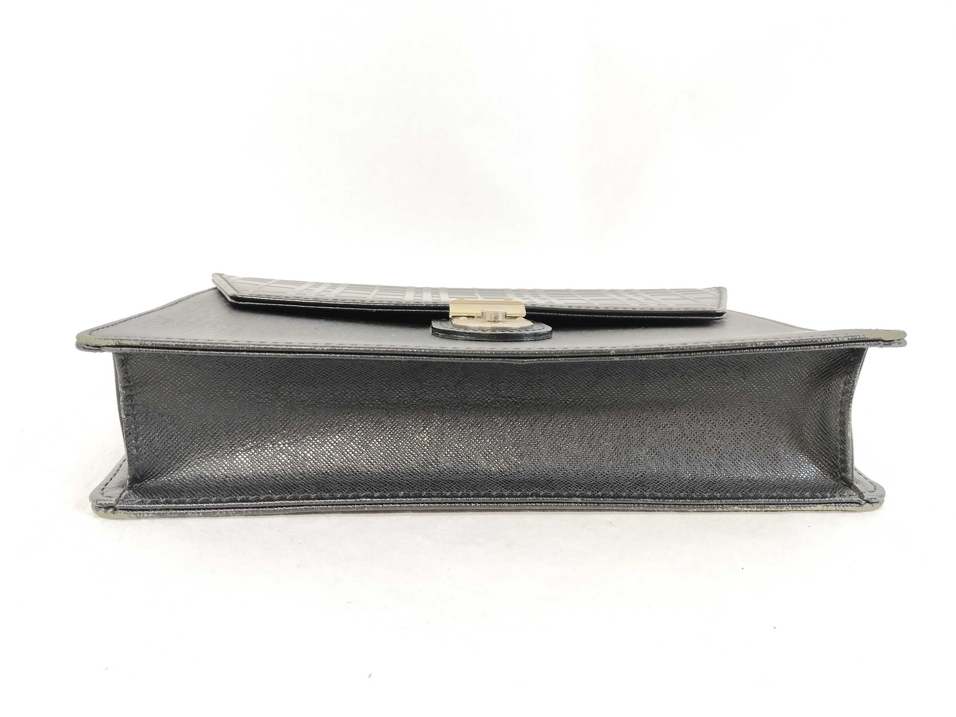 BURBERRY 18. Two Burberry clutches and a second bag
