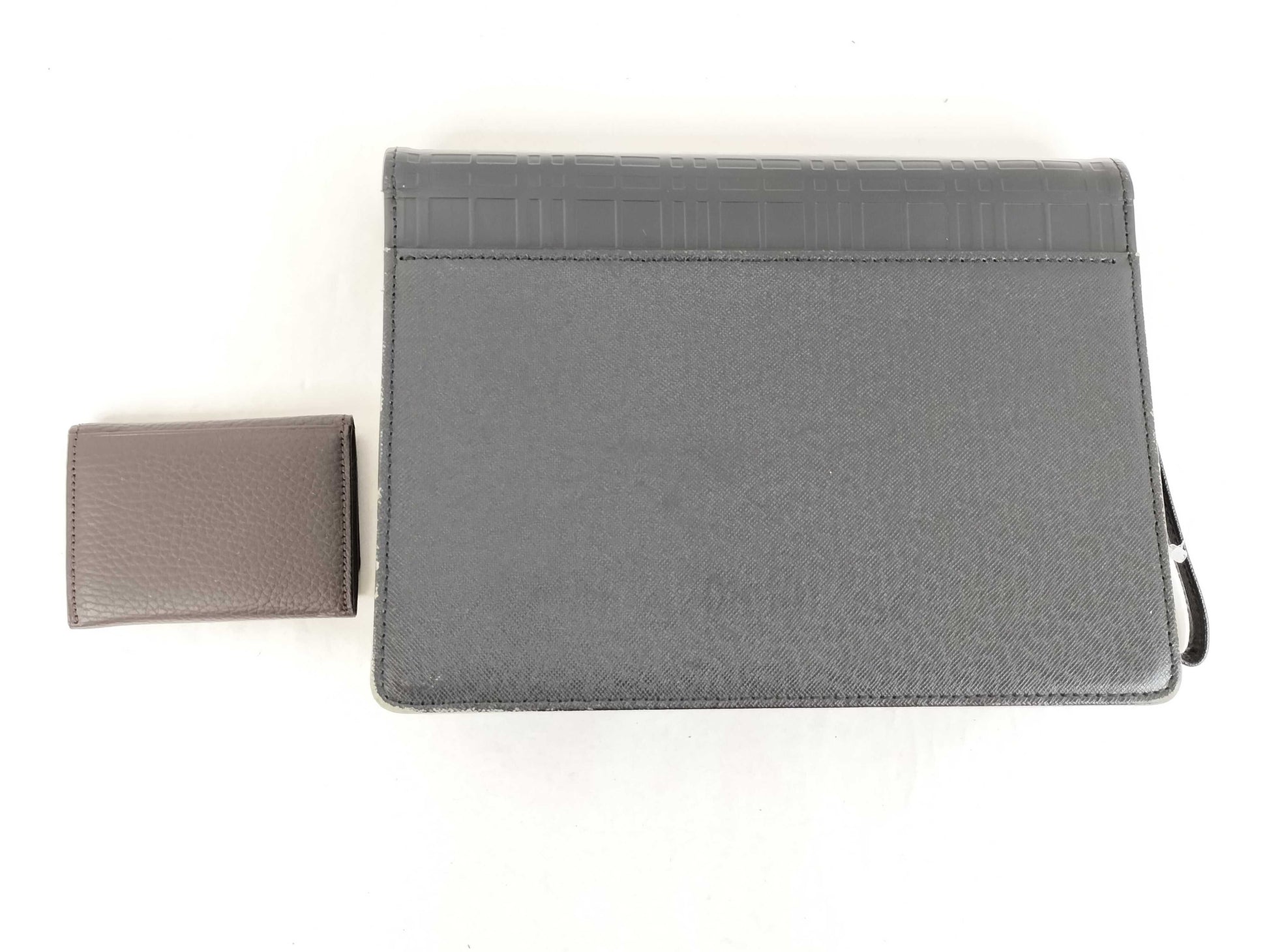 BURBERRY 18. Two Burberry clutches and a second bag