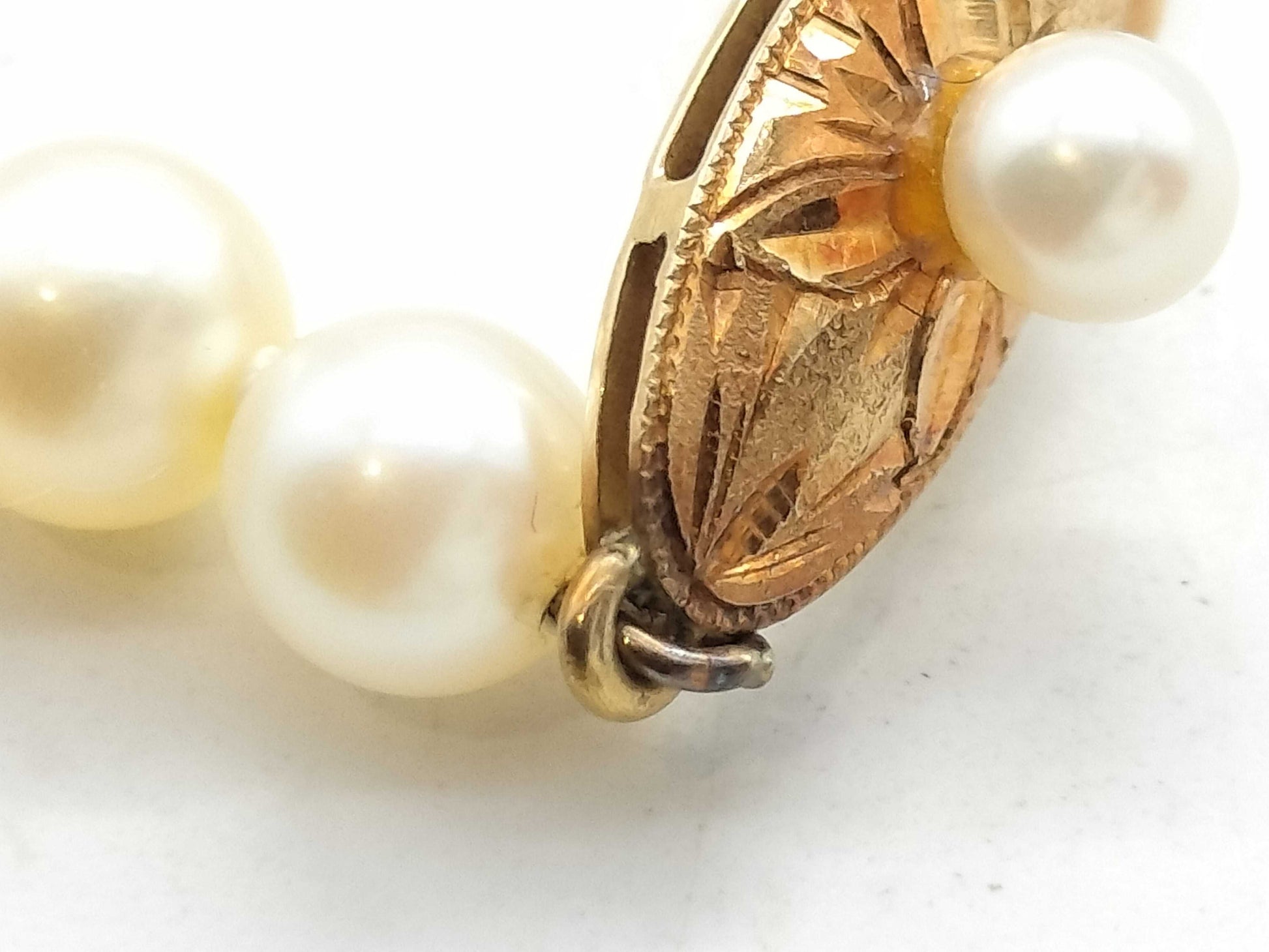 Akoya pearl necklace, diameter approximately 5.3mm-5.9mm, 18K gold, 21.4g 