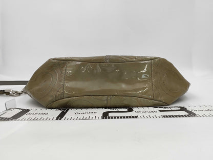 Five beautifully-fitted shoulder bags, including COACH Michael Kors.
