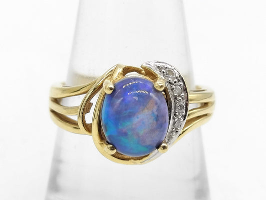 Opal diameter approximately 8.7mm x 7.3mm, diamond 18K 4.7g ring 