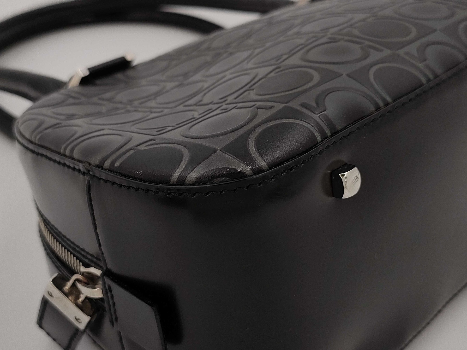 Salvatore Ferragamo Gancini Gancini all-over print leather handbag in black