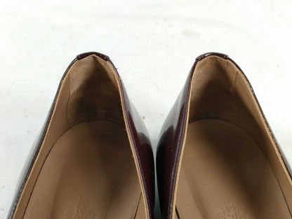 HERMES Enamel Flat Round Toe Pumps
