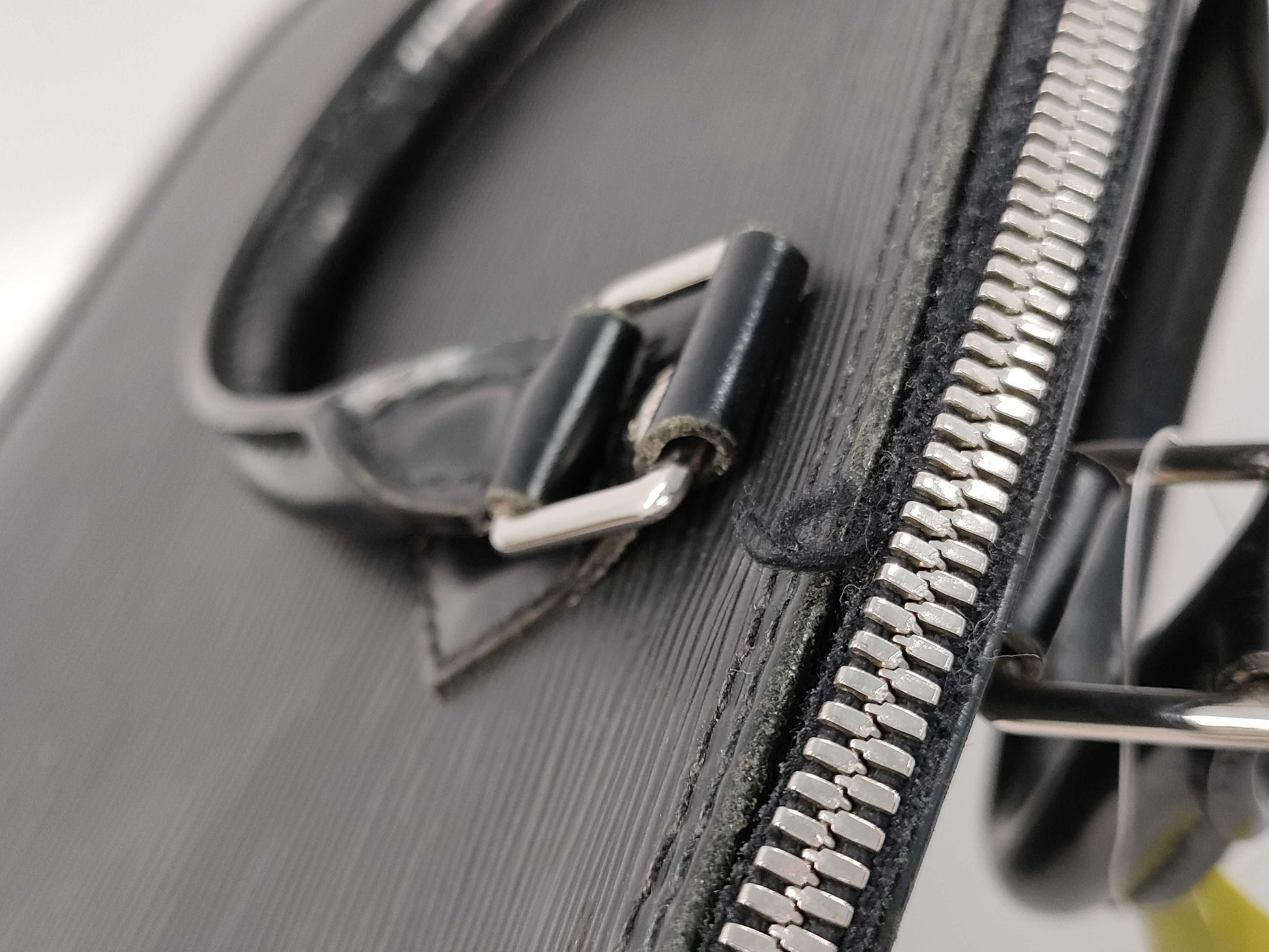 LOUIS VUITTON Epi Alma PM Boston Bag with Cracked Zipper Rail
