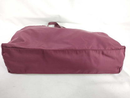 PRADA nylon handbag with leather triangle logo