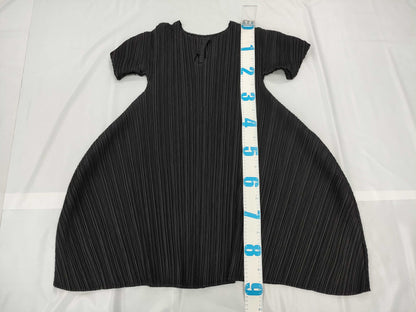 ISSEY MIYAKE Pleated Black Dress with Musical Note Design