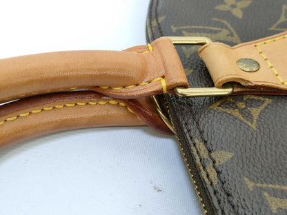 LOUIS VUITTON Monogram Alma Handbag