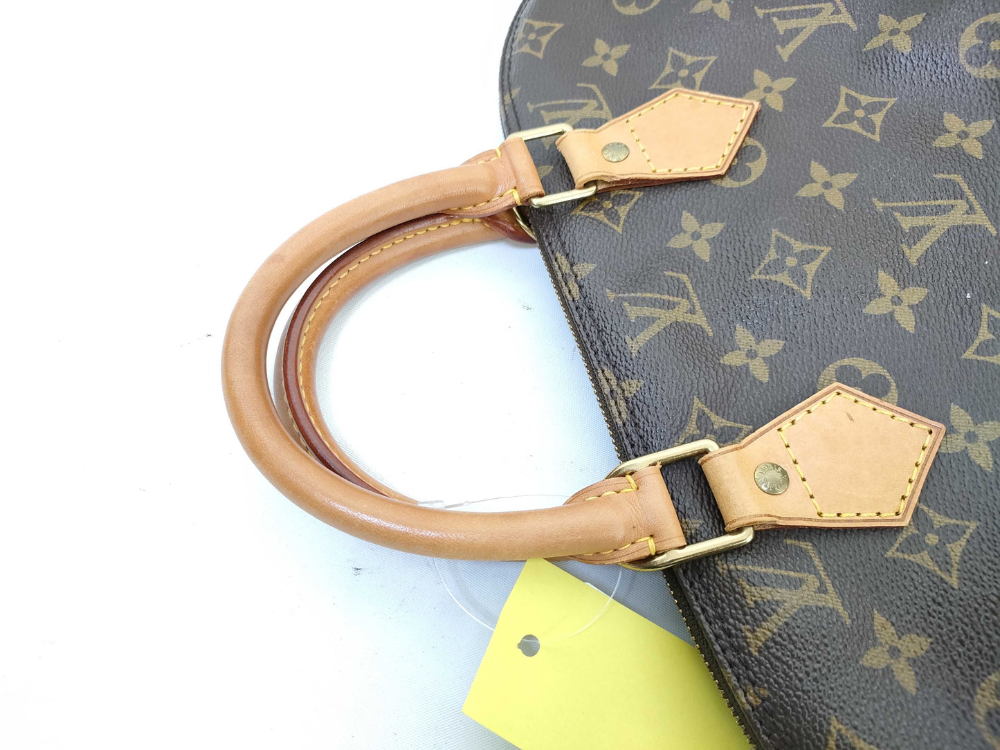 LOUIS VUITTON Monogram Alma Handbag