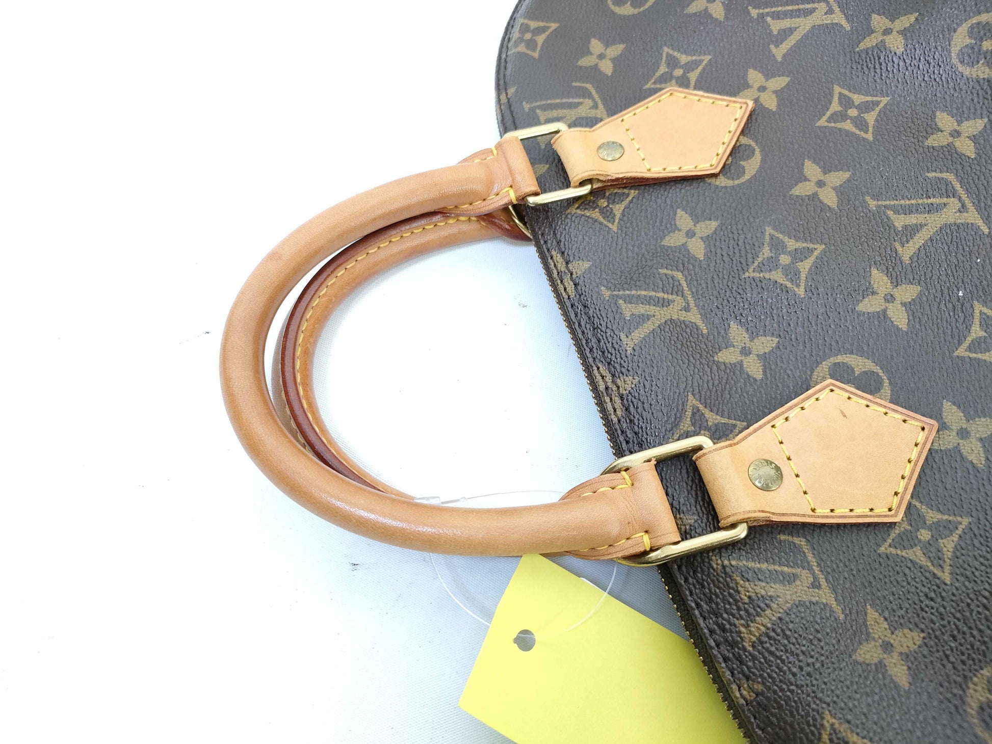 LOUIS VUITTON Monogram Alma Handbag
