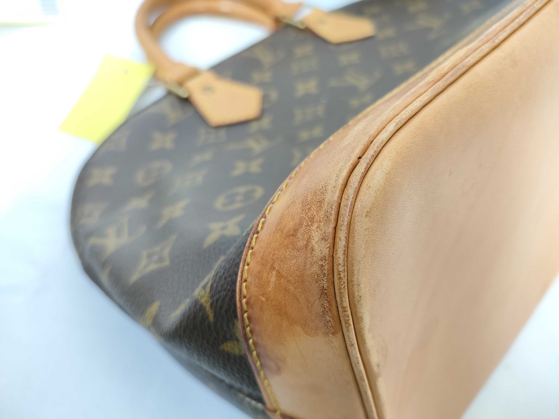 LOUIS VUITTON Monogram Alma Handbag