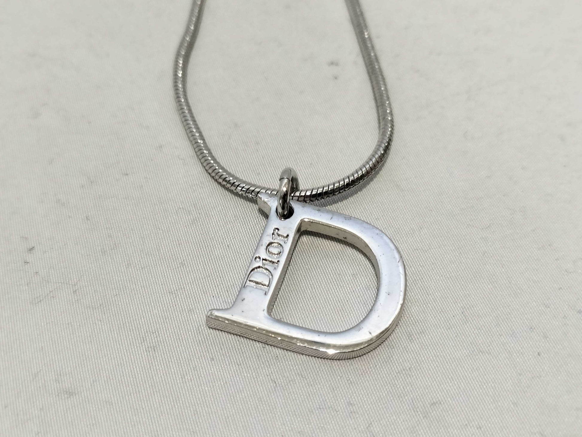 Dior D logo necklace