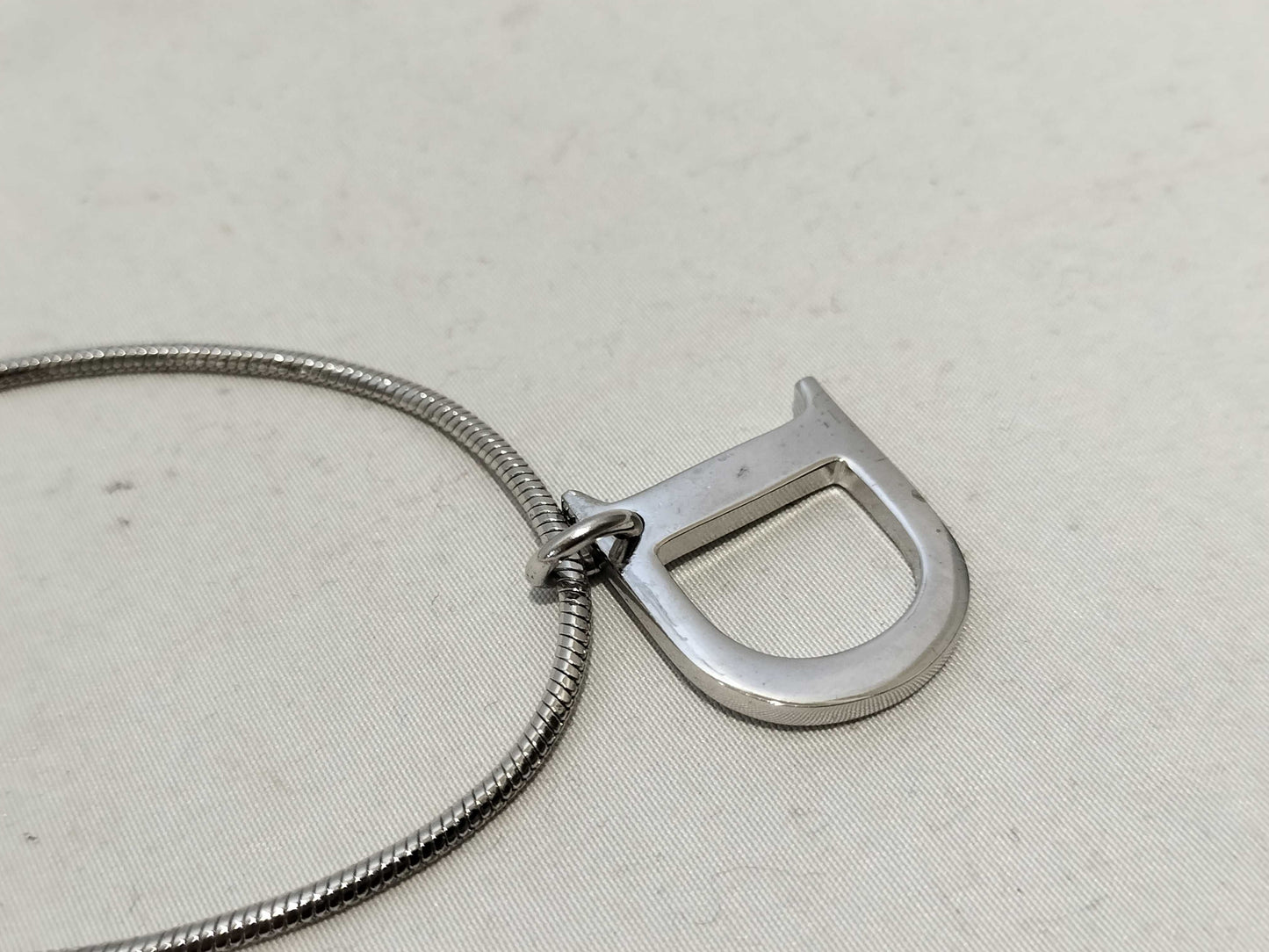 Dior D logo necklace