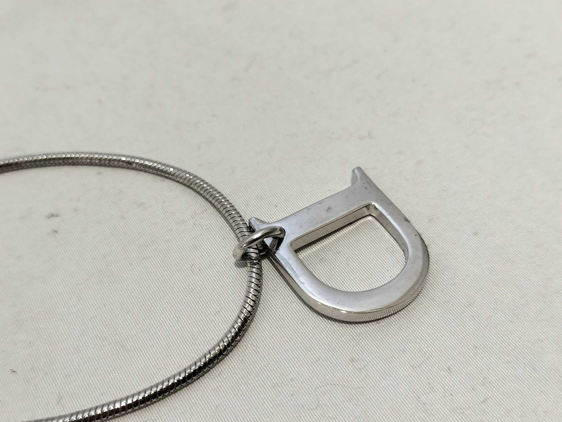 Dior D logo necklace
