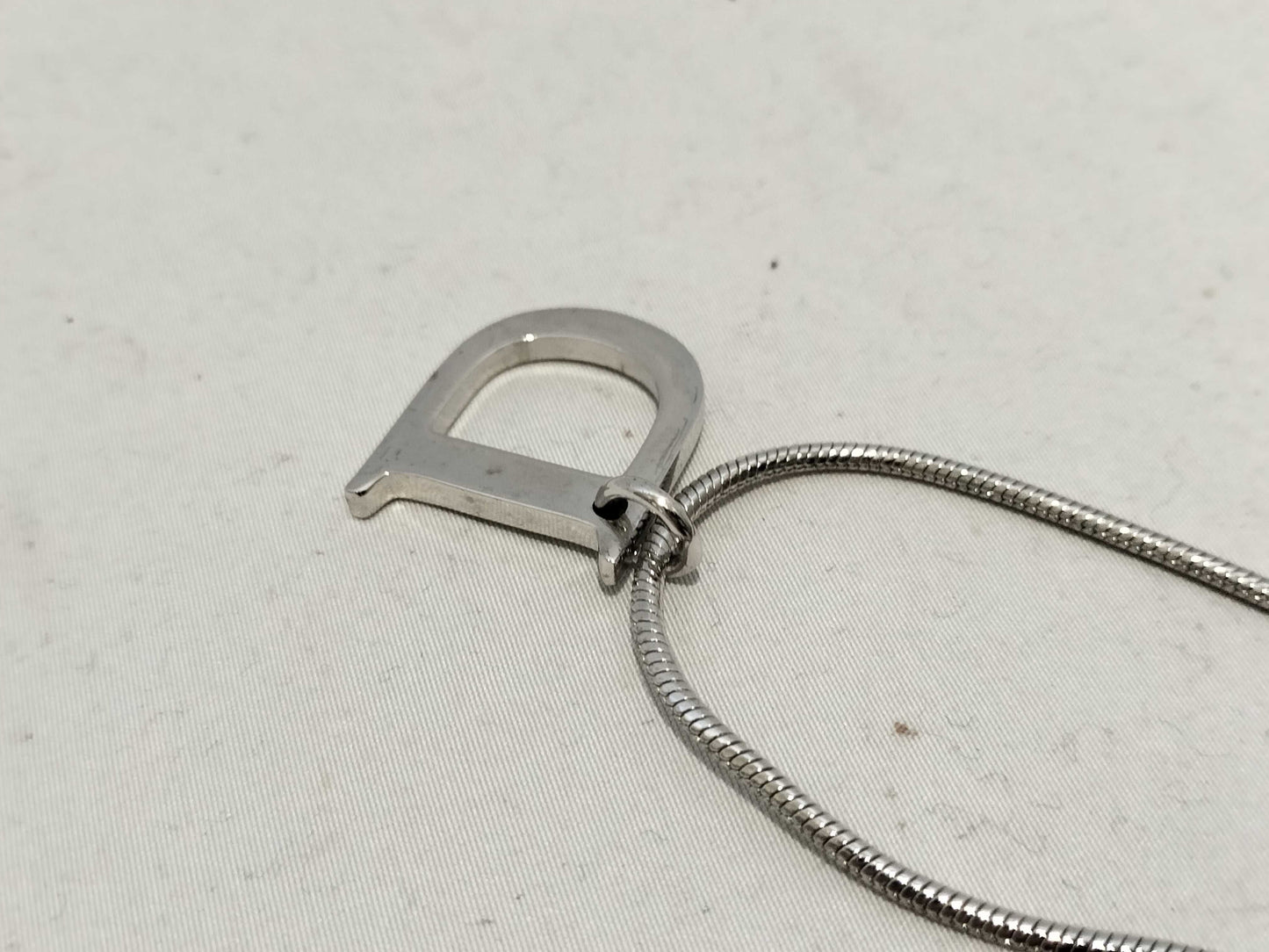 Dior D logo necklace